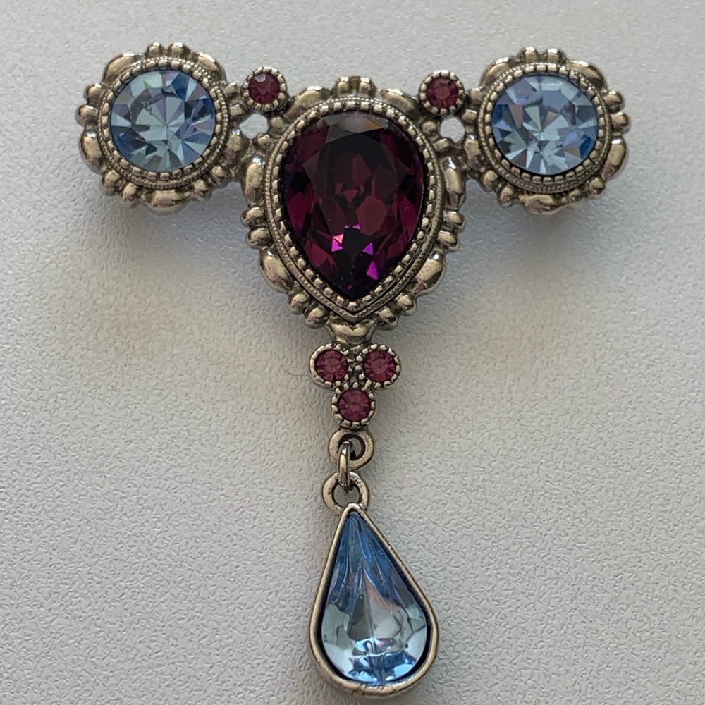 Stunning Silver and Purple Brooch with Gemstone Accents